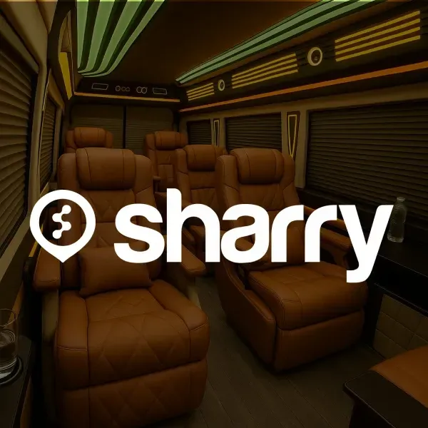 logo i nazwa firmy Sharry na tle wnętrza z fotelami typu recliner